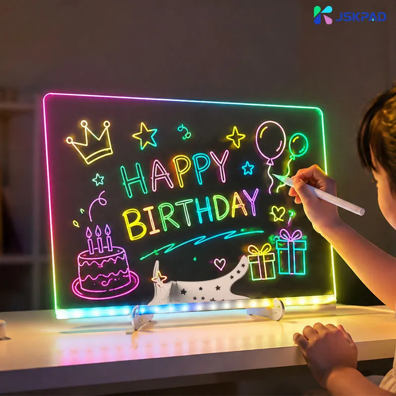 LED acrylic drawing board glowing with colorful fluorescent flower and bee drawing on desk stand