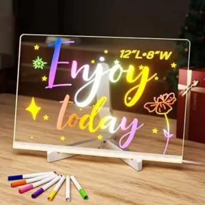 LED acrylic drawing board glowing with colorful fluorescent flower and bee drawing on desk stand