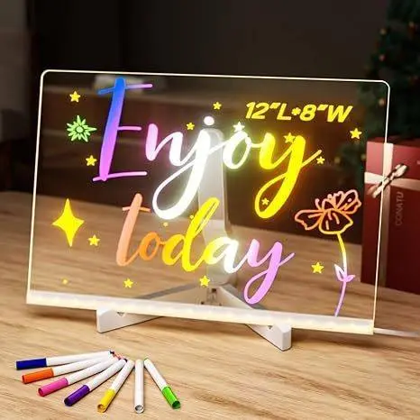 LED acrylic drawing board glowing with colorful fluorescent flower and bee drawing on desk stand